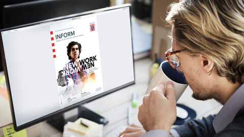 Wissenswertes rund um das Thema IT – die Publikationen der HZD Blick auf PC-Monitor, der einen Titel des HZD-Magazins INFORM zeigt
