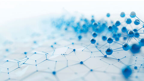 Dreidimensionales Gebilde aus pyramidenartigen Gitterelementen und Kugeln, welche die vernetzten Kooperationspartner symbolisieren